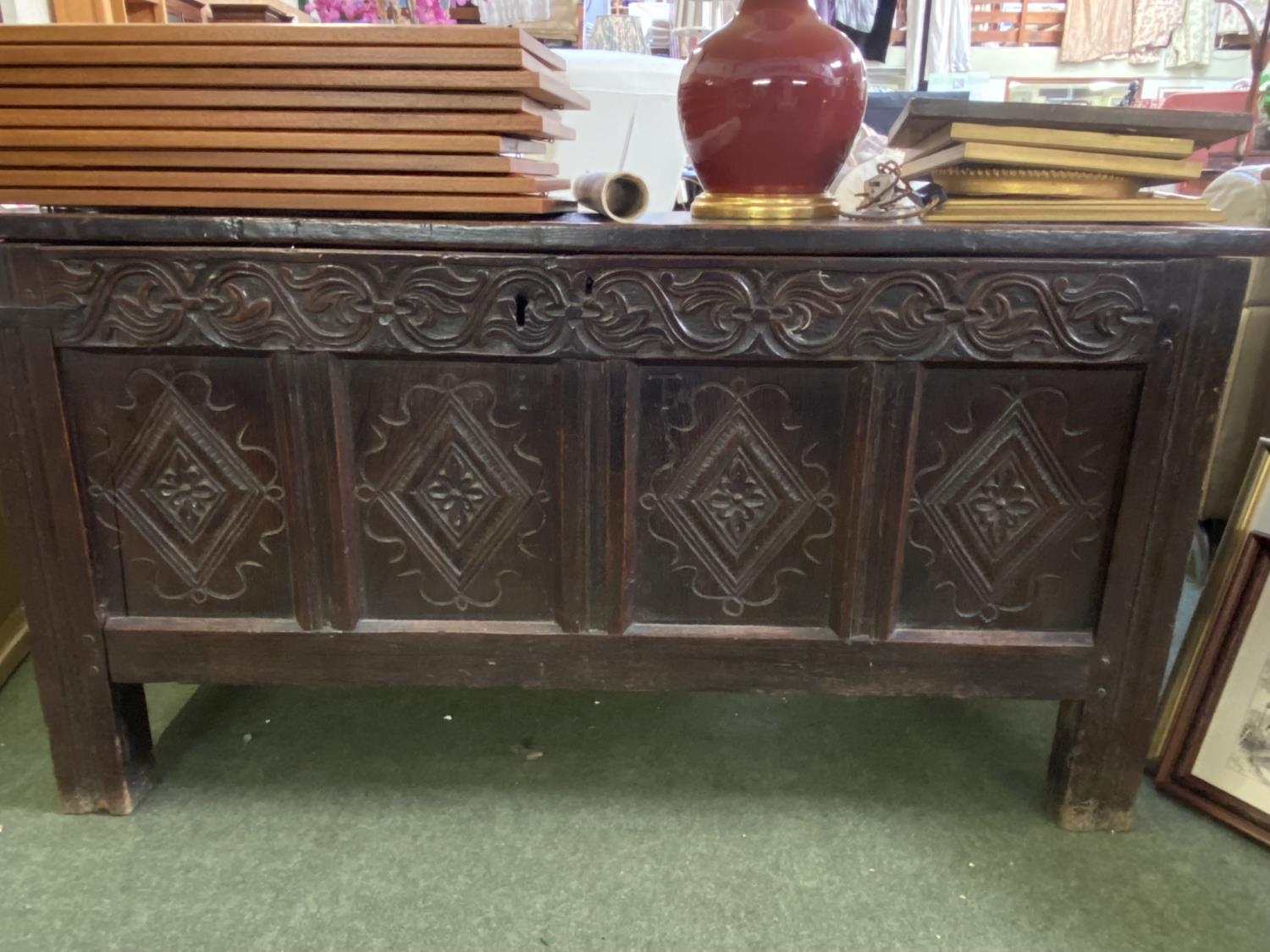 An C18th and later heavy oak plank coffer, with carved front panels and frieze, 138cm Long, 71cmH, - Image 2 of 2