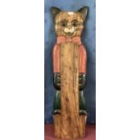 Painted wooden measuring post in the form of a cat