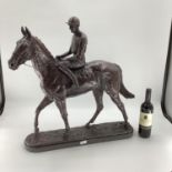 EMMA MACDERMOTT: A superb large patinated bronze figure of ARKLE AND PAT TAAFE; mounted on a p