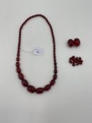 A string of cherry amber graduated beads with additional beads, 106g, 70cm