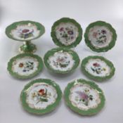 A C19th Crown Staffordshire comport and cake plate, with six plates, green and gilt edges hand