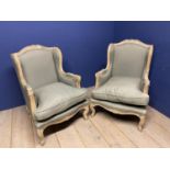 Pair of Contemporary, French style, wooden framed arm chairs, upholstered in a grey fabric