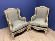 Pair of Contemporary, French style, wooden framed arm chairs, upholstered in a grey fabric