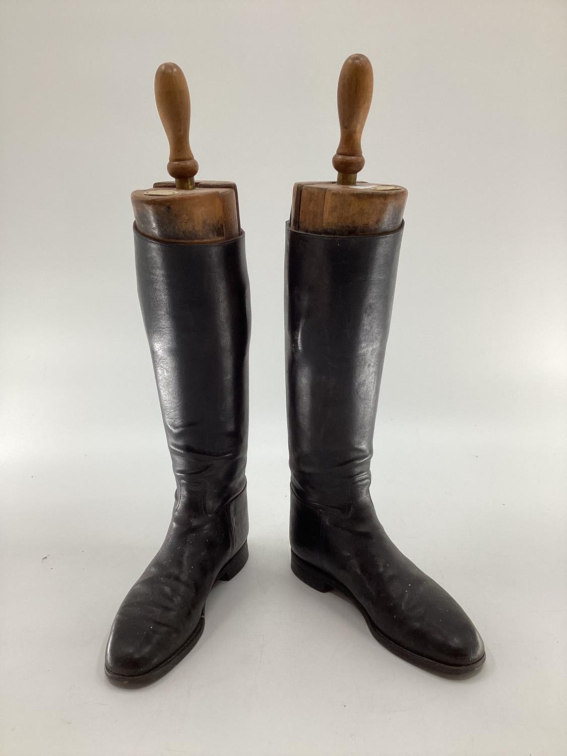 Pair of black leather hunting boots by Rowell and Sons Melton Mowbray with wooden trees