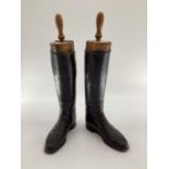 Pair of black leather hunting boots by Rowell and Sons Melton Mowbray with wooden trees