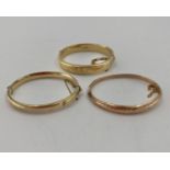 Three 9ct gold bangle bracelets 34.8g