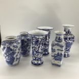 Decorative Modern Blue and White China: a pair of scalloped edge vases, decorated foliage and