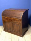 Victorian roll top desk with fitted interior , over a slide out writing surface above 2 drawers