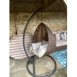 GARDEN FURNITURE: a large garden hanging swing chair with brown cushions, made brown faux wicker/all