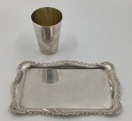 A Victorian sterling silver beaker together with a small oblong silver card tray with cast scrolling