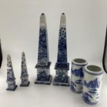 Decorative Modern Blue and White China: Pair of tall obelisks, with green baize to base, 63cmH,