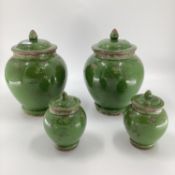 Set of 4 decorative modern green ginger jars and covers, approx height of tallest 33cm; no sign of