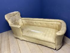 A Victorian bath shaped Chaise Longue , with buttoned arms and back and original ivory silk