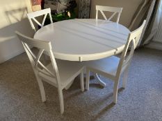 A modern, circular, white pedestal kitchen table, approx 120cm diameter and chairs