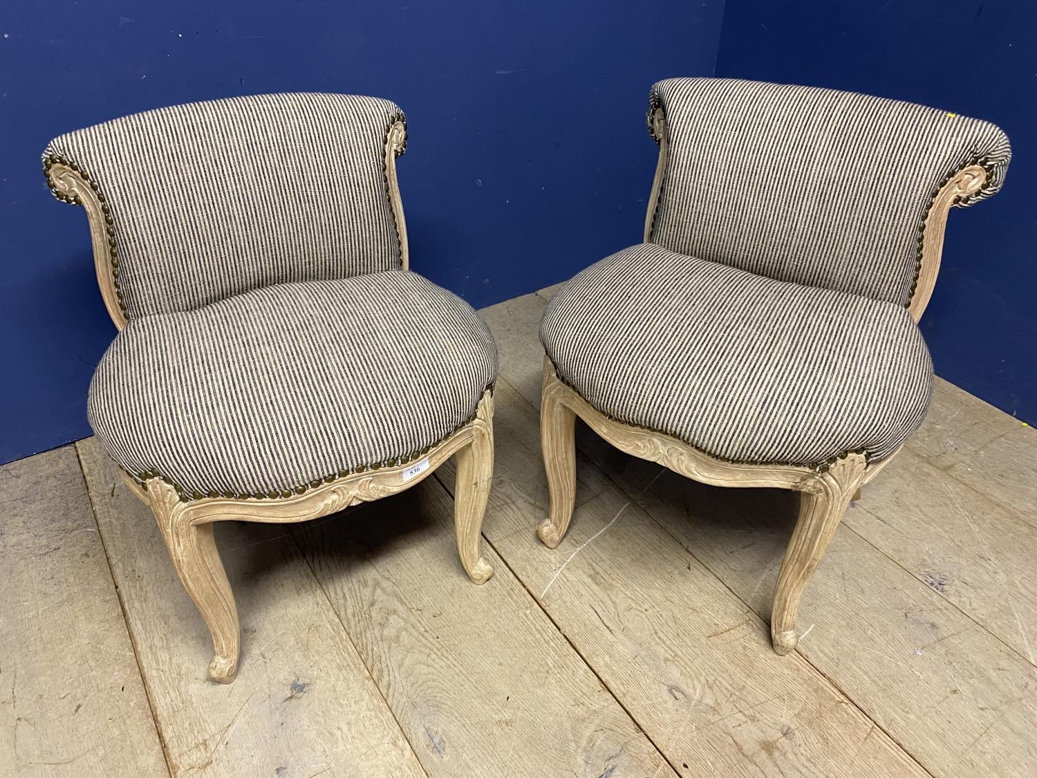 Pair of modern small French style low back chairs, chairs, upholstered in a striped fabric