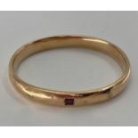 A 14k gold bangle bracelet 16.2 g (not marked)