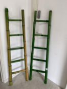 A pair of faux bamboo decorative ladders