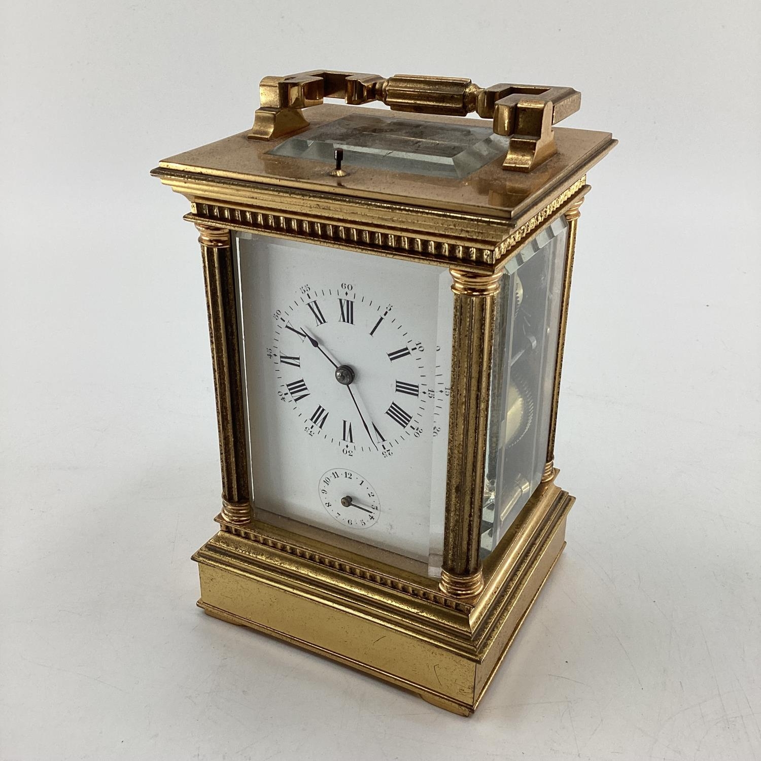 A gilt brass carriage clock, with five glass panels, striking on a gong. - Image 2 of 7