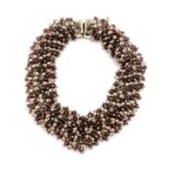 A Sterling silver and bead necklace by HO HO silver. Stamped 925 with import marks. In original