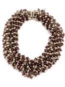 A Sterling silver and bead necklace by HO HO silver. Stamped 925 with import marks. In original