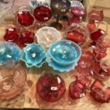 A quantity of coloured glass to include: pair of cranberry glass decorative baskets with rope