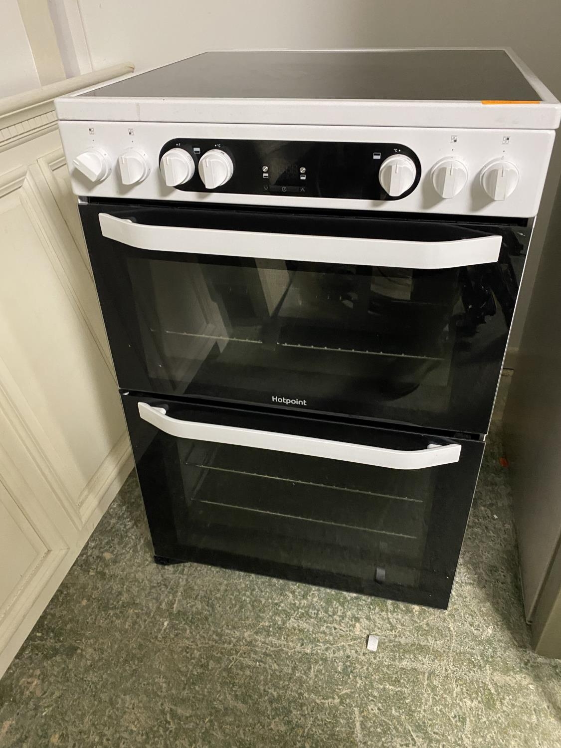 Hotpoint cooker, with paperwork (auctioneer cannot guarantee working order of this lot, it is from a
