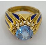 18ct gold enamel pale blue Spinel ring, central round cut cornflower spinel in a 4 prong setting