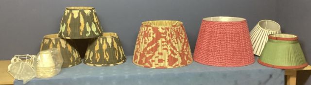 A quantity of OKA and other lamp shades, including a large pink Pooky shade, see photos