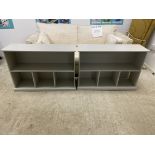 A pair of grey painted low book shelves