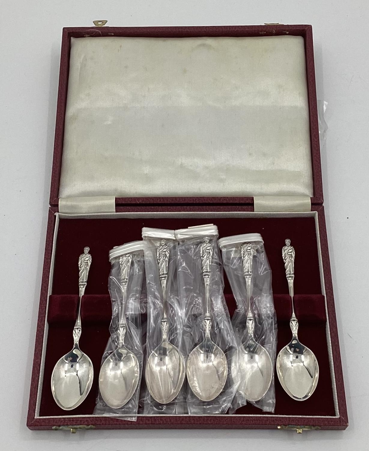 A boxed set of 6 sterling silver tea spoons with apostle finials by Deakin & Francis, Birmingham