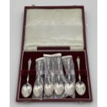 A boxed set of 6 sterling silver tea spoons with apostle finials by Deakin & Francis, Birmingham