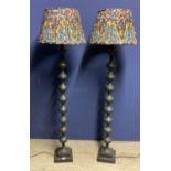 A pair of good decorative bobbin columned standard lamps, with OKA pleated shades107H, 142cm overall