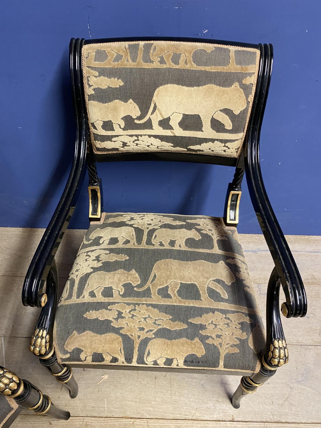 Pair of contemporary black and gilt armchairs, upholstered in an African Safari upholstery, one - Image 5 of 5