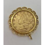 A $20 gold coin 1874 in a 9ct pierced bezel mount 39.32g