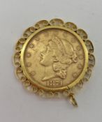 A $20 gold coin 1874 in a 9ct pierced bezel mount 39.32g