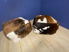 Pair of modern cow hide skin plush footstools/pouffes