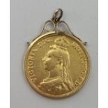 An 1887 £2 gold coin in a 9ct bezel mount 17.36g