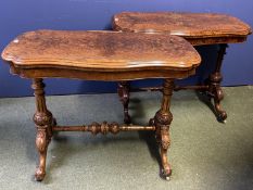 Two very similar Victorian burr walnut fold over serpentine topped card tables, with green baize