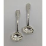 A pair of sterling silver sauce ladles by Eley Fearn and Chawner, London 1810, 131g