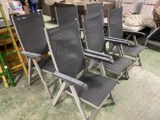 GARDEN FURNITURE: a set of grey and black folding garden chairs