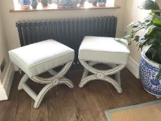 Pair of contemporary X framed brass studded stools, entirely upholstered in a blue fabric