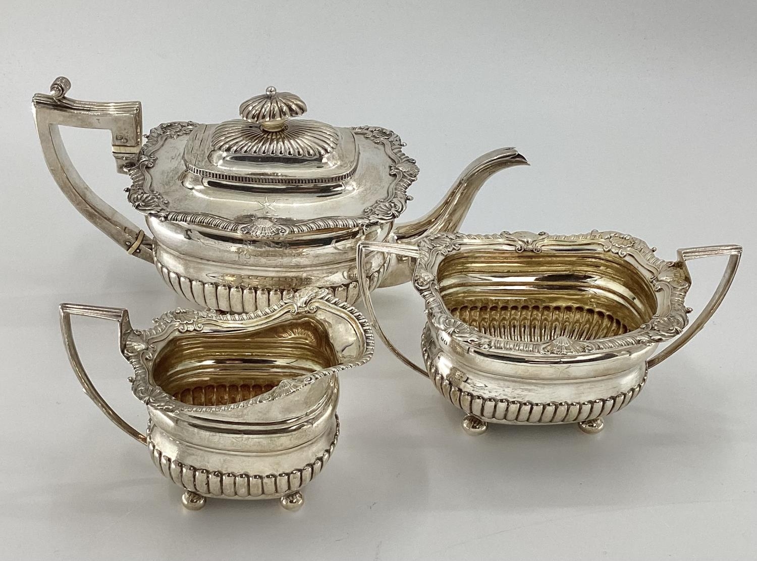 A sterling silver 3 piece tea set of half reeded design by JW Story and W Elliot, Lon - Image 3 of 8