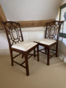 Pair of mahogany Chinese style cock spur backed chairs with inset cream upholstered seat