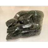 Gideon Nynhongo (born 1967) Reclining figure, abstract green marble sculpture, 46cmc 38cm, signed to