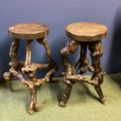 Pair of rustic branch and root support circular wooden stools, possibly olive wood, 70cm H