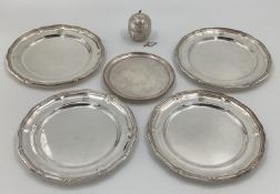 A small Egyptian silver lidded bowl together with a set of four silver plated dishes and one smaller