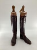 Pair of ladies brown leather boots by Maxwell, with trees