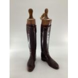 Pair of ladies brown leather boots by Maxwell, with trees