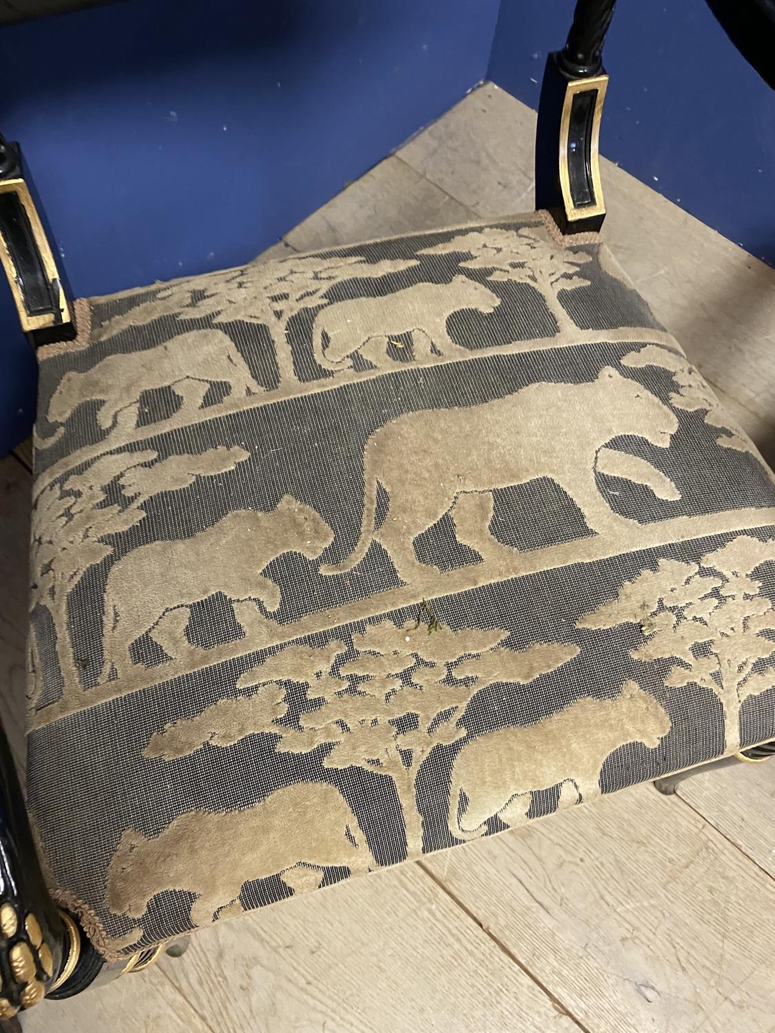 Pair of contemporary black and gilt armchairs, upholstered in an African Safari upholstery, one - Image 3 of 5