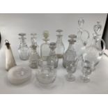 Quantity of decanters, pair of claret jugs, and a frosted glass small corked vase, engraved